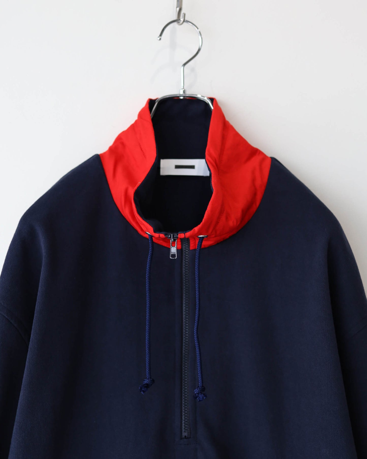 STAND COLLAR HALF ZIP SWEAT "NAVY × RED"